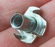 Photo of a tee nut.